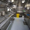 What is the cleaning schedule in a commercial kitchen?